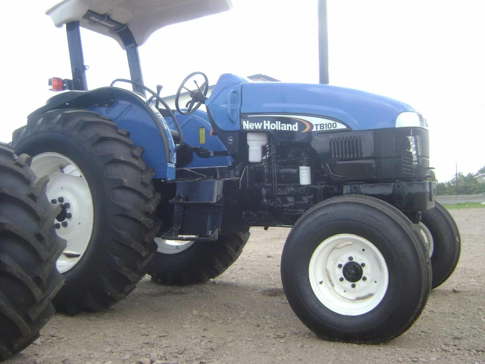 new holland tb100 4 cylinder compact tractor parts list manual book.jpg