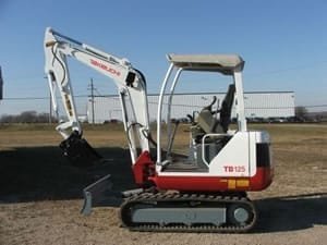 takeuchi tb125 operators manual parts book 2.jpg